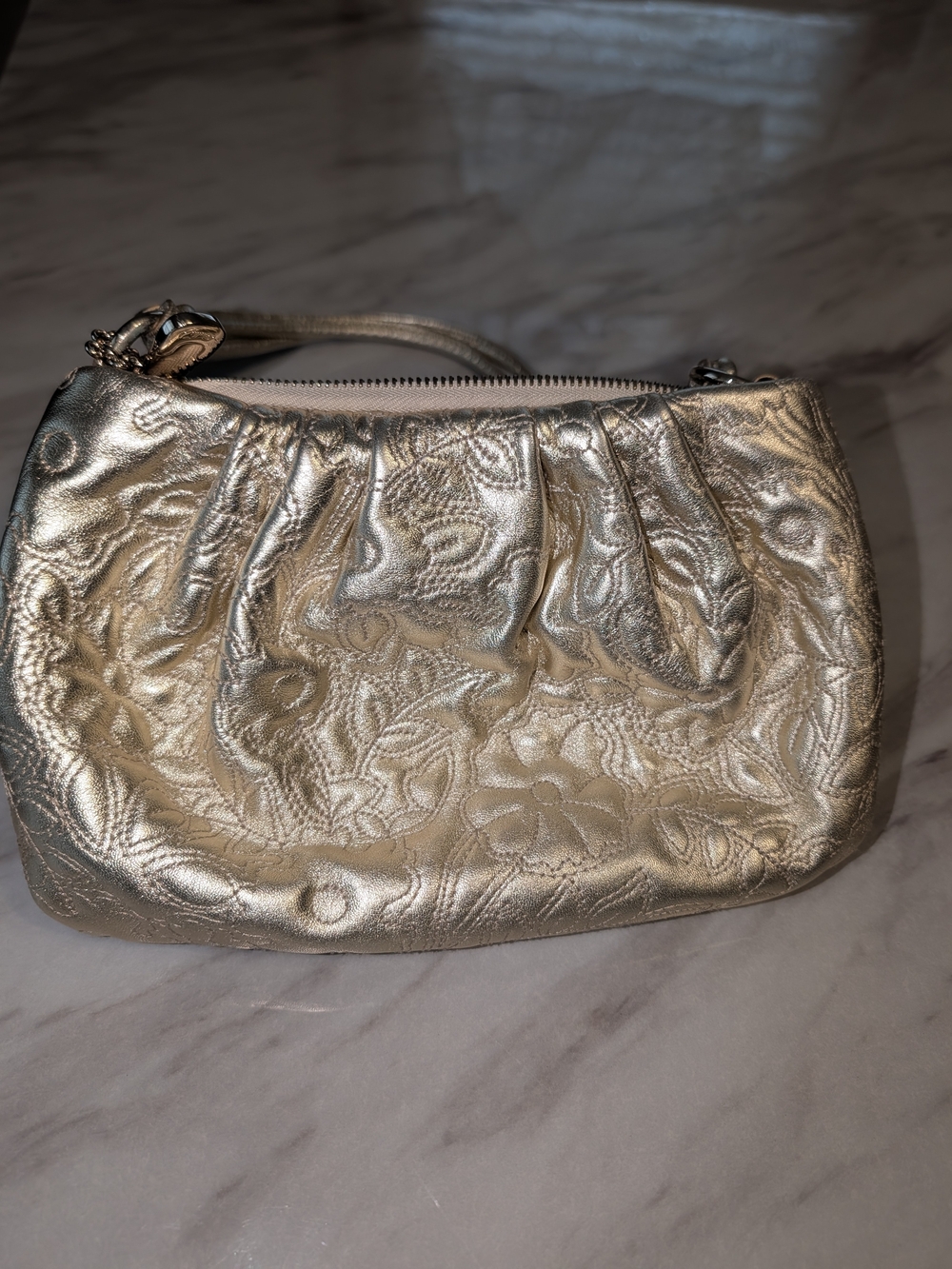 Bally Metallic Gold Floral Embossed Wristlet